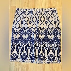 Lila Rose size 8 pencil skirt with slit. Ivory with beautiful blue pattern.